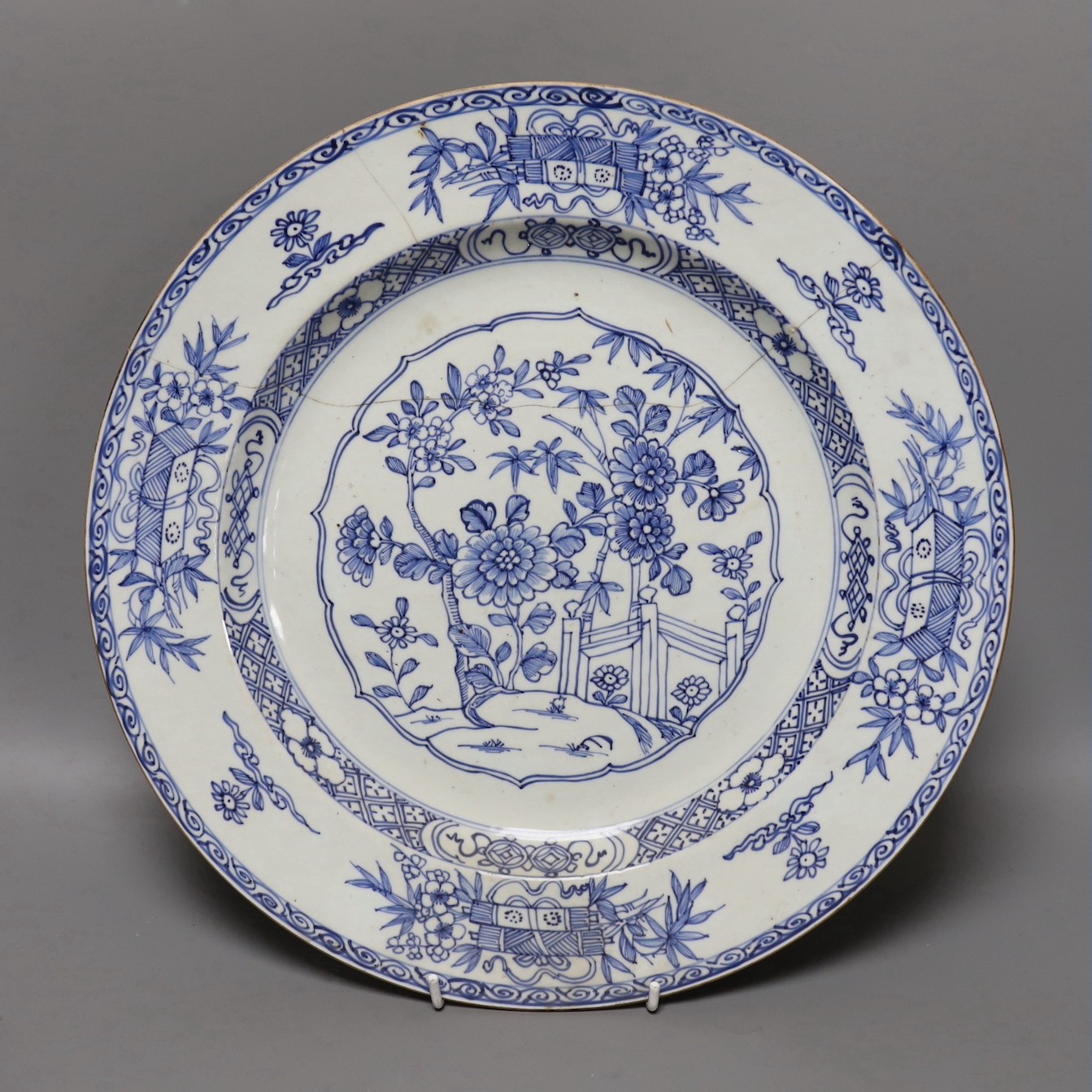 Three Chinese export blue and white dishes, 18th/19th century, largest 42cms wide